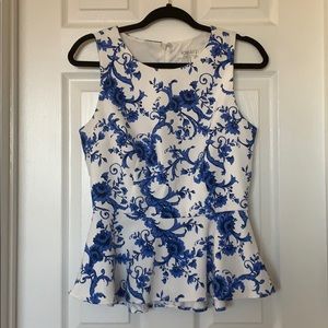 White and blue Peplum top.